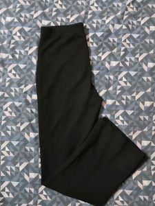 Tourser Pants With Little Flare At The Bottom
