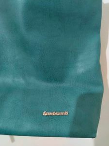 Fastrack Teal Sling Bag – Used, Good Condition