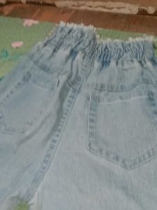 Ripped High-Waisted Jeans