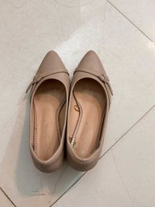 Elegant Nude Heels with Bow Detail