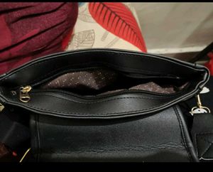 Classy black sling bag for women