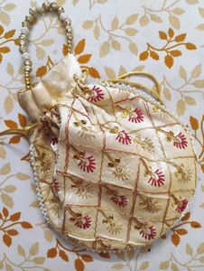 Ethenic Gold Coloured Potli Bag