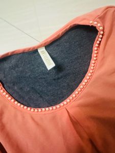 Coral Sleeveless Top