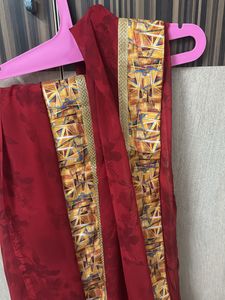 Red Saree With Yellow Design Border.