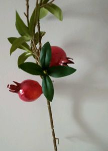 Home Centre&#39;s  Orange And Pomegranate Sticks
