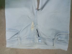 Jeans. Slightly Damaged.