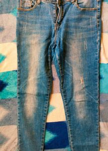 Distressed Denim Jeans