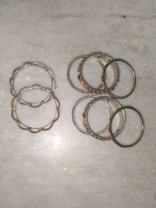2 Sets Of Two Shiny Bangles