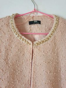 Chic Pearl-Trimmed Blush Jacket