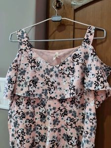 peach and black colored evening gown