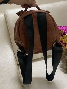 Steve Madden Embossed Brown Mini Backpack