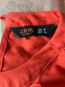 Zink Orange Sleeveless Top
