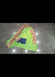 Eligent Green Saree With Peacock Pattern
