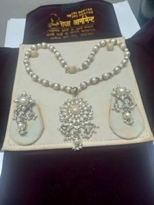 White Pearl Necklace With Pair Of Earings.