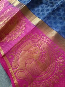 A Pattu Navy Blue nd Pink Coloured Saree.