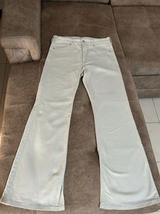 Cream bootcut Jeans