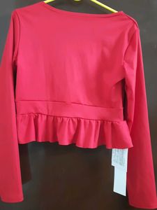 Red Ruffle Hem Long Sleeve Top