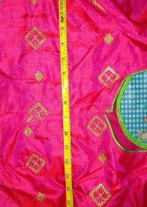 Parrot green saree with boat neck pink blouse