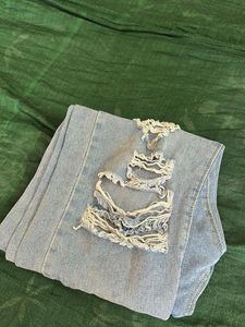 Ripped Light Wash Denim Jeans