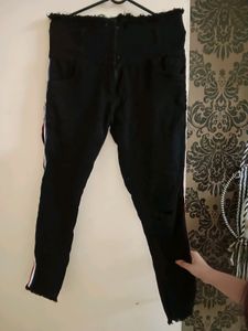 Black One Leg Knee Cut Jeans