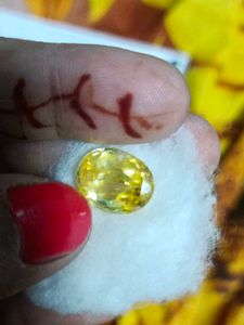 A yellow sapphire, also known as Pukhraj (पुखराज)
