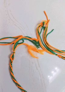Orange And Green Thread Rakhi