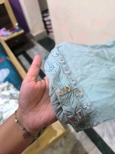 Teal kurti, pant and chunni set.
