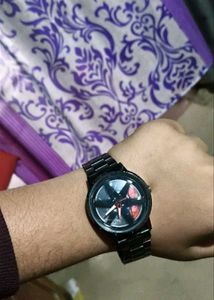 Red colour full wheel rotating analog watch