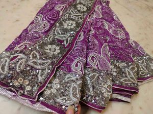 very heavy work purple saree