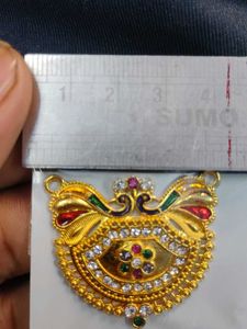 Gold Pendant with Gemstones