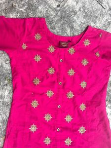 A Pink Top With Gold Floral Thread Work