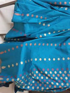Uppada Pattu Teal Blue Saree with Gold Detail
