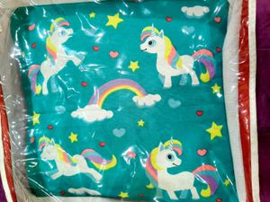Unicorn Print cushion cum travel.blanket.