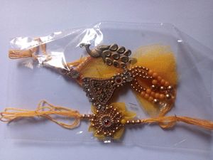 Handmade Rakhi for Brother and Bhabhi Combo Set