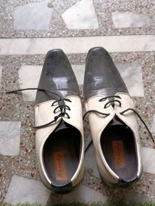 black white polished formal shoes