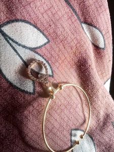 Gold Tone Bangle with Charm