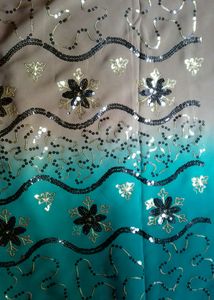 Chiffon Or Suythetic Saree.