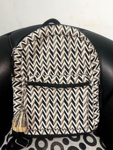 Black & Beige Printed Backpack