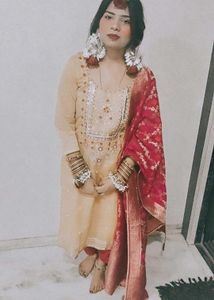Yellow Salwar Kameez with Pink Dupatta