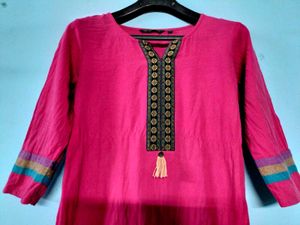 Simple & Stylish Pink Kurti with Ethnic Detailing