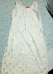 Sleeveless Beige Colour Kurti