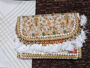 White embroidered jaipuri bags💌