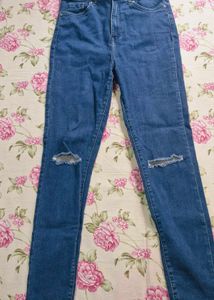Ripped Knee Jeans
