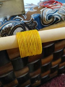 red and yellow bangles
