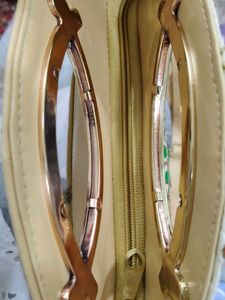 Handbag With Adjustable Sling