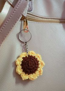 It is beautiful handmade crochet sunflower keychai