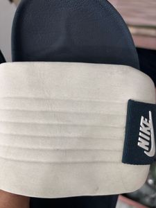 Original NIKE Slides