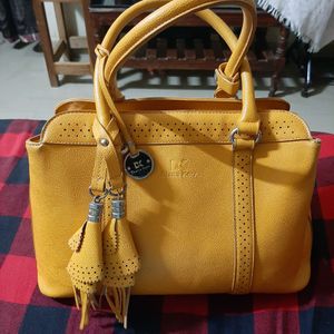 Diana Korr mustard coloured bag