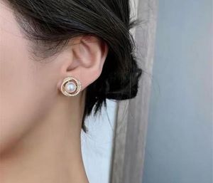 Halo Gold Plated Stud Earrings with Faux Pearl