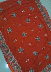 Elegant orange Embroidered Saree